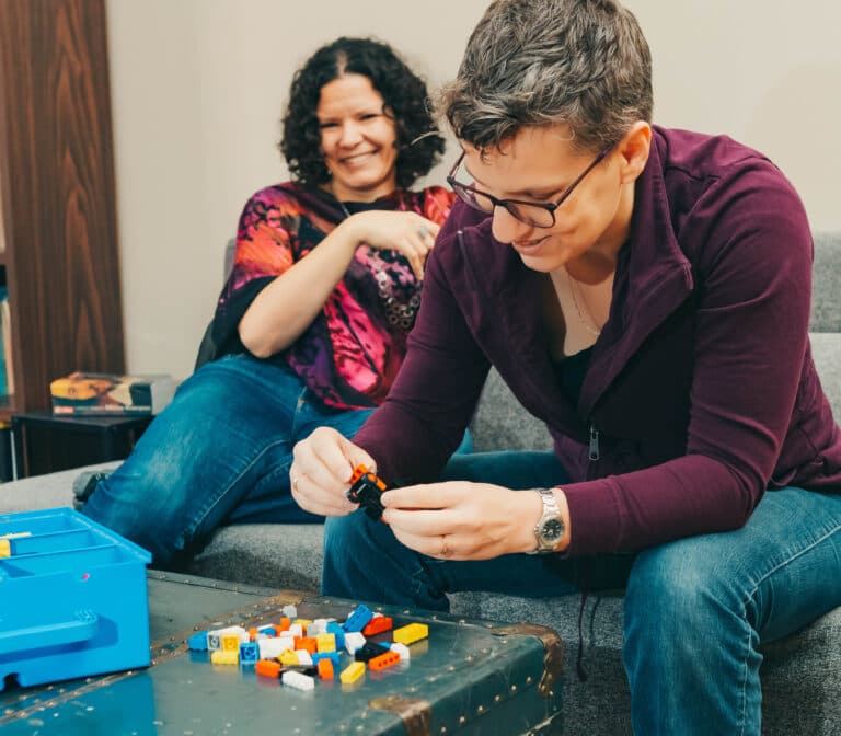 Breanne and Jae playing with Lego